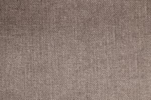 Natural Linen Material Textile Canvas Fabric Texture Background Close-up Detail of Fabric Natural Color Hemp Material Pattern Design Wallpaper. Can be Used as Background or For Graphic Design photo