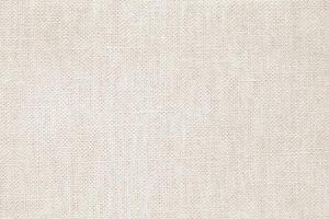Natural Linen Material Textile Canvas Fabric Texture Background Close-up Detail of Fabric Natural Color Hemp Material Pattern Design Wallpaper. Can be Used as Background or For Graphic Design photo