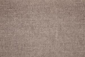 Natural Linen Material Textile Canvas Fabric Texture Background Close-up Detail of Fabric Natural Color Hemp Material Pattern Design Wallpaper. Can be Used as Background or For Graphic Design photo