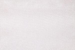 Natural Linen Material Textile Canvas Fabric Texture Background Close-up Detail of Fabric Natural Color Hemp Material Pattern Design Wallpaper. Can be Used as Background or For Graphic Design photo
