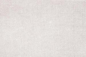 Natural Linen Material Textile Canvas Fabric Texture Background Close-up Detail of Fabric Natural Color Hemp Material Pattern Design Wallpaper. Can be Used as Background or For Graphic Design photo