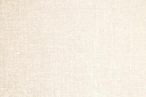 Natural Linen Material Textile Canvas Fabric Texture Background Close-up Detail of Fabric Natural Color Hemp Material Pattern Design Wallpaper. Can be Used as Background or For Graphic Design photo