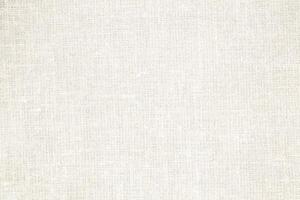 Natural Linen Material Textile Canvas Fabric Texture Background Close-up Detail of Fabric Natural Color Hemp Material Pattern Design Wallpaper. Can be Used as Background or For Graphic Design photo