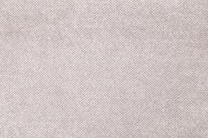 Natural Linen Material Textile Canvas Fabric Texture Background Close-up Detail of Fabric Natural Color Hemp Material Pattern Design Wallpaper. Can be Used as Background or For Graphic Design photo