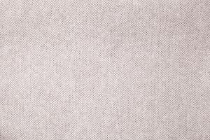 Natural Linen Material Textile Canvas Fabric Texture Background Close-up Detail of Fabric Natural Color Hemp Material Pattern Design Wallpaper. Can be Used as Background or For Graphic Design photo