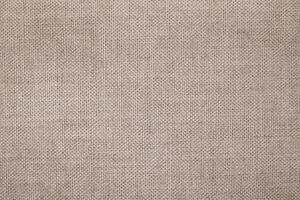 Natural Linen Material Textile Canvas Fabric Texture Background Close-up Detail of Fabric Natural Color Hemp Material Pattern Design Wallpaper. Can be Used as Background or For Graphic Design photo