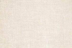 Natural Linen Material Textile Canvas Fabric Texture Background Close-up Detail of Fabric Natural Color Hemp Material Pattern Design Wallpaper. Can be Used as Background or For Graphic Design photo