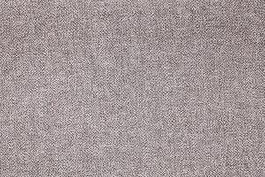 Natural Linen Material Textile Canvas Fabric Texture Background Close-up Detail of Fabric Natural Color Hemp Material Pattern Design Wallpaper. Can be Used as Background or For Graphic Design photo