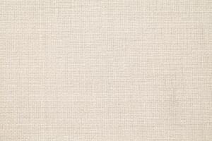 Natural Linen Material Textile Canvas Fabric Texture Background Close-up Detail of Fabric Natural Color Hemp Material Pattern Design Wallpaper. Can be Used as Background or For Graphic Design photo