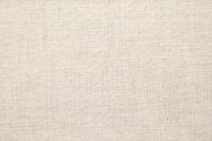 Natural Linen Material Textile Canvas Fabric Texture Background Close-up Detail of Fabric Natural Color Hemp Material Pattern Design Wallpaper. Can be Used as Background or For Graphic Design photo