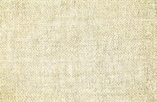 Natural Linen Material Textile Canvas Fabric Texture Background Close-up Detail of Fabric Natural Color Hemp Material Pattern Design Wallpaper. Can be Used as Background or For Graphic Design photo