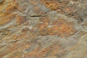 Abstract Natural Rock Stone Granite Grunge Rusty Metal Texture Design Background Natural Color Stone Material Granite Design Wallpaper. Close-up Detail of Natural Stone photo