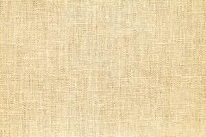 Natural Linen Material Textile Canvas Fabric Texture Background Close-up Detail of Fabric Natural Color Hemp Material Pattern Design Wallpaper. Can be Used as Background or For Graphic Design photo