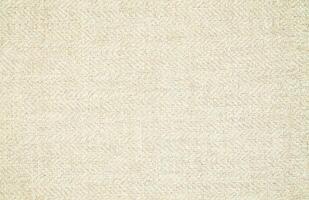 Natural Linen Material Textile Canvas Fabric Texture Background Close-up Detail of Fabric Natural Color Hemp Material Pattern Design Wallpaper. Can be Used as Background or For Graphic Design photo