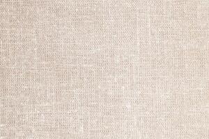Natural Linen Material Textile Canvas Fabric Texture Background Close-up Detail of Fabric Natural Color Hemp Material Pattern Design Wallpaper. Can be Used as Background or For Graphic Design photo