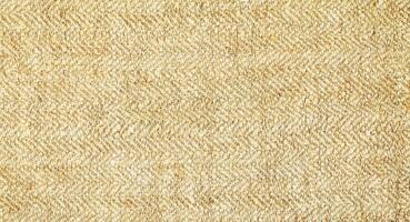 Natural Linen Material Textile Canvas Fabric Texture Background Close-up Detail of Fabric Natural Color Hemp Material Pattern Design Wallpaper. Can be Used as Background or For Graphic Design photo