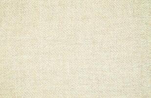 Natural Linen Material Textile Canvas Fabric Texture Background Close-up Detail of Fabric Natural Color Hemp Material Pattern Design Wallpaper. Can be Used as Background or For Graphic Design photo
