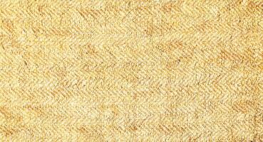 Natural Linen Material Textile Canvas Fabric Texture Background Close-up Detail of Fabric Natural Color Hemp Material Pattern Design Wallpaper. Can be Used as Background or For Graphic Design photo
