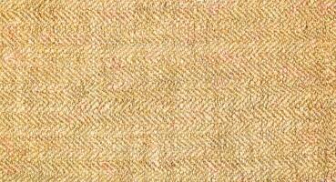 Natural Linen Material Textile Canvas Fabric Texture Background Close-up Detail of Fabric Natural Color Hemp Material Pattern Design Wallpaper. Can be Used as Background or For Graphic Design photo