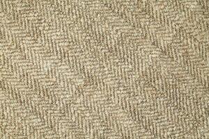 Natural Linen Material Textile Canvas Fabric Texture Background Close-up Detail of Fabric Natural Color Hemp Material Pattern Design Wallpaper. Can be Used as Background or For Graphic Design photo