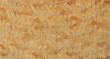 Natural Linen Material Textile Canvas Fabric Texture Background Close-up Detail of Fabric Natural Color Hemp Material Pattern Design Wallpaper. Can be Used as Background or For Graphic Design photo