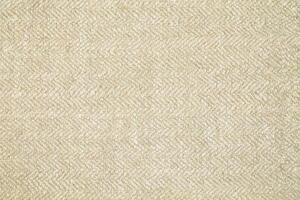 Natural Linen Material Textile Canvas Fabric Texture Background Close-up Detail of Fabric Natural Color Hemp Material Pattern Design Wallpaper. Can be Used as Background or For Graphic Design photo