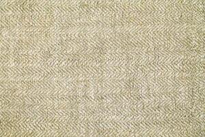 Natural Linen Material Textile Canvas Fabric Texture Background Close-up Detail of Fabric Natural Color Hemp Material Pattern Design Wallpaper. Can be Used as Background or For Graphic Design photo