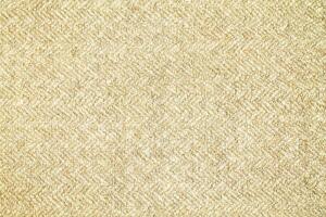 Natural Linen Material Textile Canvas Fabric Texture Background Close-up Detail of Fabric Natural Color Hemp Material Pattern Design Wallpaper. Can be Used as Background or For Graphic Design photo