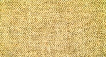 Natural Linen Material Textile Canvas Fabric Texture Background Close-up Detail of Fabric Natural Color Hemp Material Pattern Design Wallpaper. Can be Used as Background or For Graphic Design photo