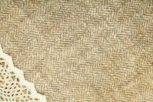 Natural Linen Material Textile Canvas Fabric Texture Background Close-up Detail of Fabric Natural Color Hemp Material Pattern Design Wallpaper. Can be Used as Background or For Graphic Design photo