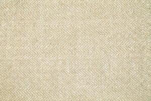 Natural Linen Material Textile Canvas Fabric Texture Background Close-up Detail of Fabric Natural Color Hemp Material Pattern Design Wallpaper. Can be Used as Background or For Graphic Design photo