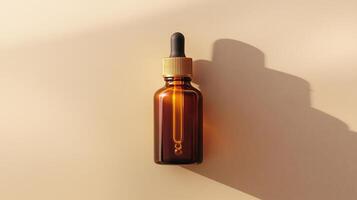 A brown glass bottle with an amber dropper for skin care on beige background. photo
