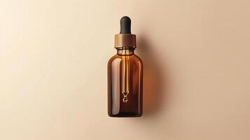 A brown glass bottle with an amber dropper for skin care on beige background. photo