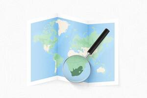 Enlarge South Africa with a magnifying glass on a folded map of the world. vector