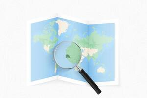 Enlarge Senegal with a magnifying glass on a folded map of the world. vector
