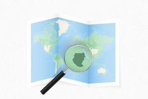 Enlarge Sudan with a magnifying glass on a folded map of the world. vector