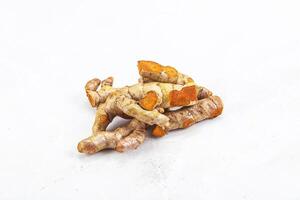 Fresh young Tumeric root heap photo