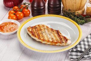 Grilled turkey fillet steak with sauce photo