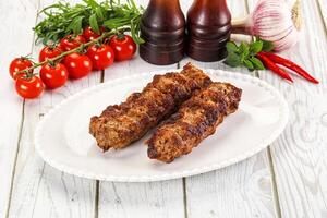 Chicken kebab minced meat and spices photo