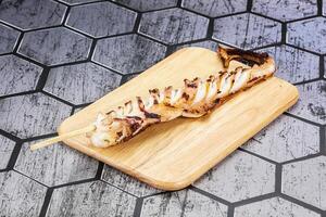 Delicous tasty Grilled octopus tentacle photo