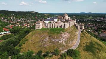 Aerial orbiting view of castle Sumeg in Hungary in July 2024 video