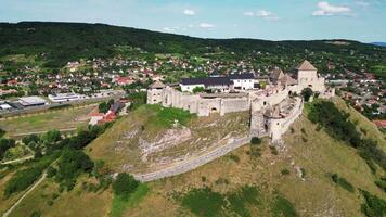 Aerial backwards view of castle Sumeg in Hungary in July 2024 video