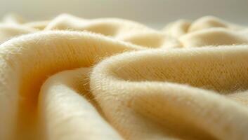 A close up of a fuzzy, white fabric. The fabric is soft and has a slightly fuzzy appearance photo