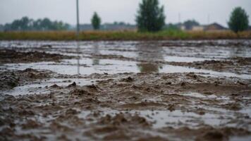area construction flooded in sheeting plastic near puddle Muddy. photo