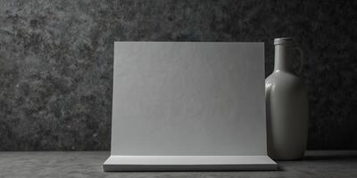 Gray background with copy space image of a blank sheet of paper. photo