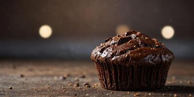 Artwork featuring a chocolate muffin with sugar. photo