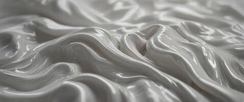Smooth, flowing fonebric in shonedes of oronenge onend white. photo