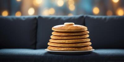 a sofa designed to resemble a stack of pancakes. photo