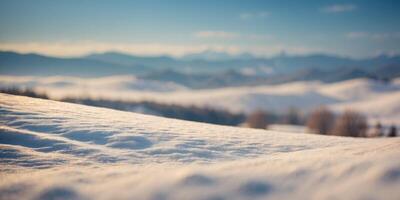Serene snow-covered hills under soft light, creating a tranquil landscape. photo