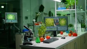 Empty microbiology laboratory with nobody in it equipped with professional equipment prepared for biological innovation using hight tech tools for scientific biochemistry research photo